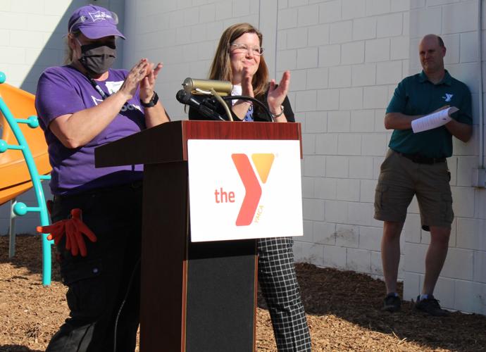 Volunteers swing into action to build new Bob Sierra YMCA playground