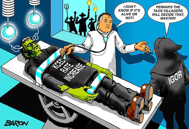 Bill Baron exhibits editorial cartoons from The Taos News | | taosnews.com