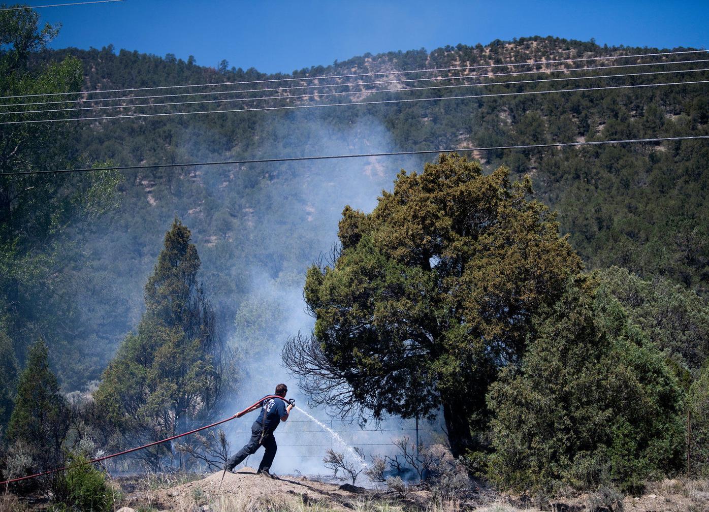 Taos County firefighters put out small forest fire near Talpa