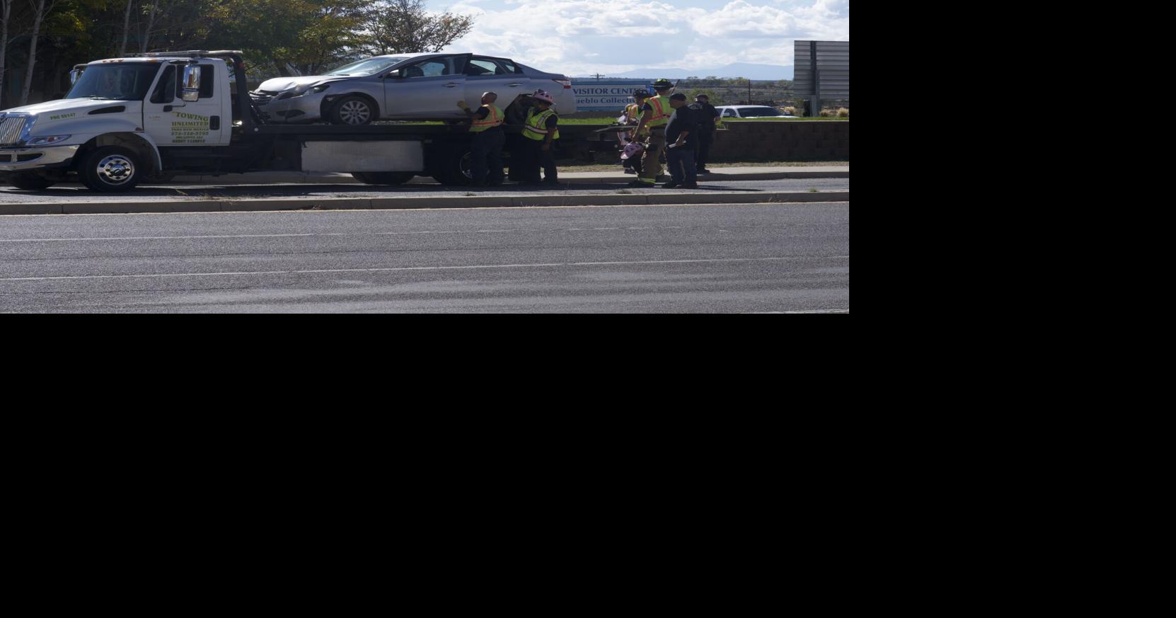 Crashed car loaded onto flatbed