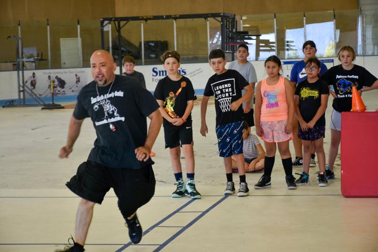 Youth basketball camp pays dividends for Taos High players, Sports