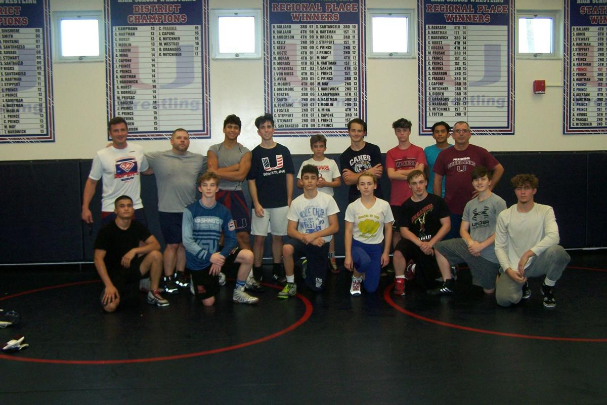 Wrestling 'a way of life' for Palm Harbor High coach North County