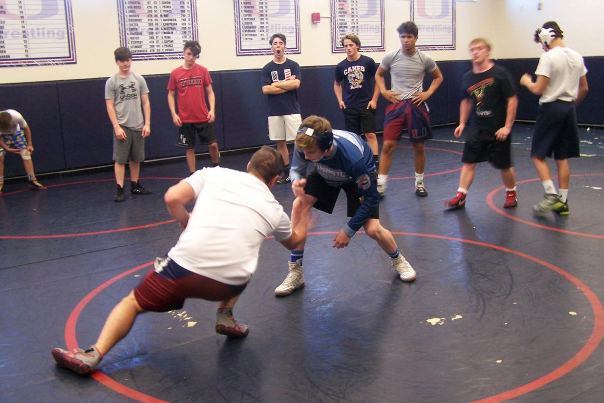 Wrestling 'a way of life' for Palm Harbor High coach North County