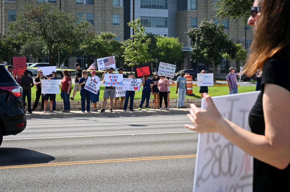 Protest on both sides of street