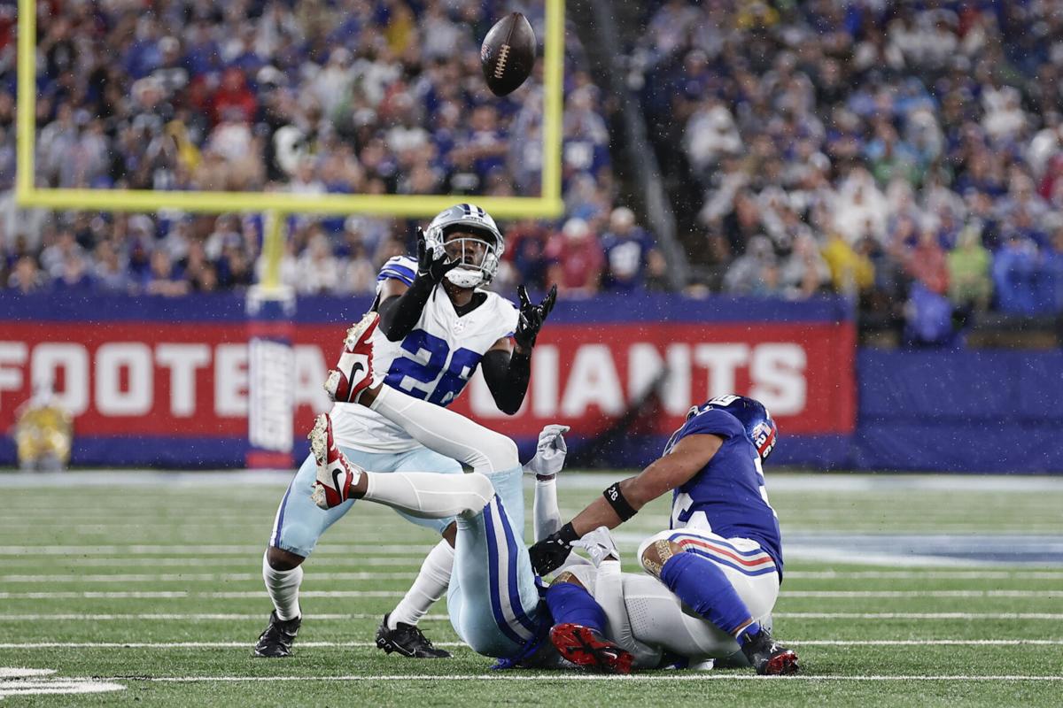 Dallas Cowboys John Phillips scores a touchdown against the