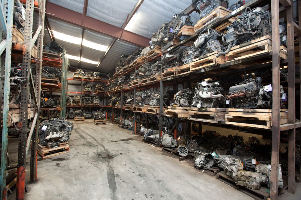 Employees' hard work pays off at auto parts recycling business