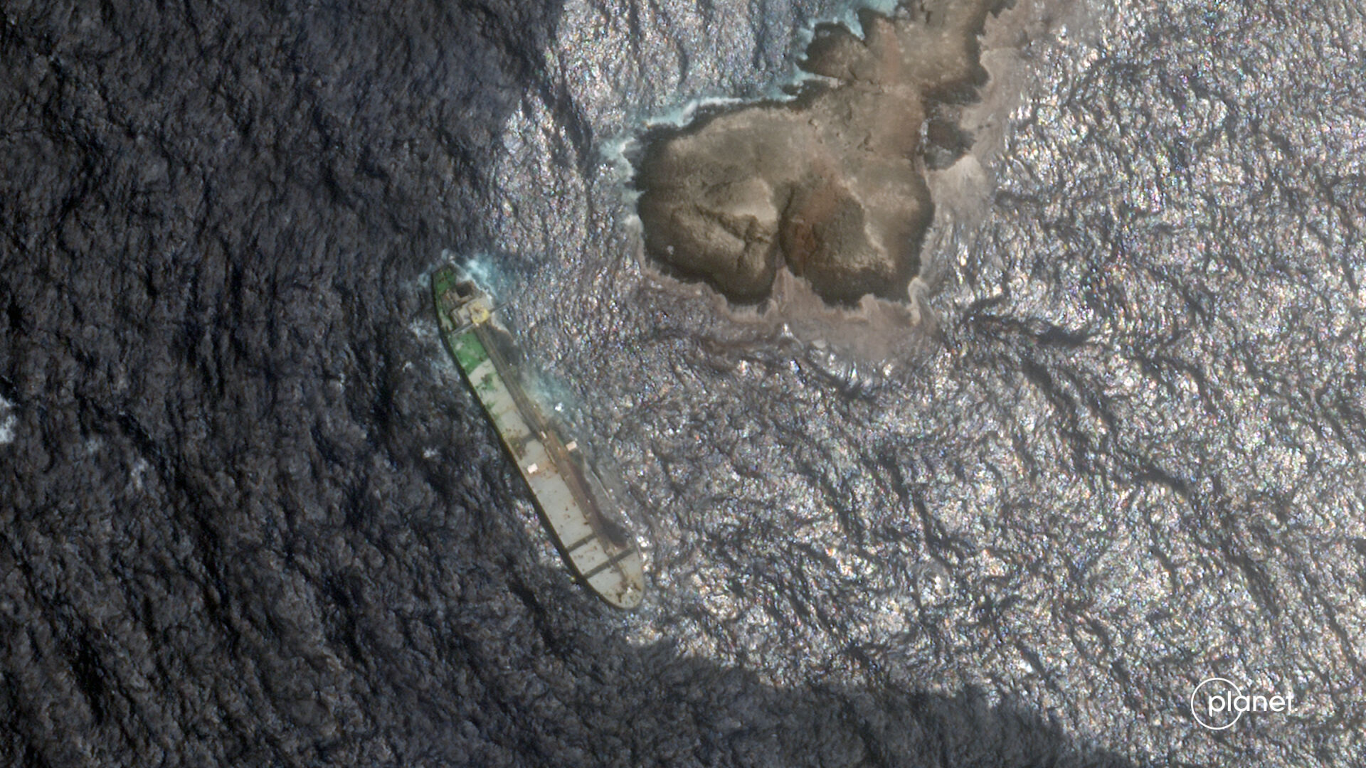 Oil leak spreads from a sanctioned tanker grounded off Oman
