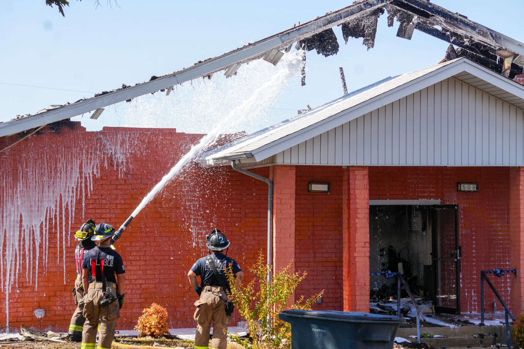 Sparks from nearby salvage yard lead to massive fire at