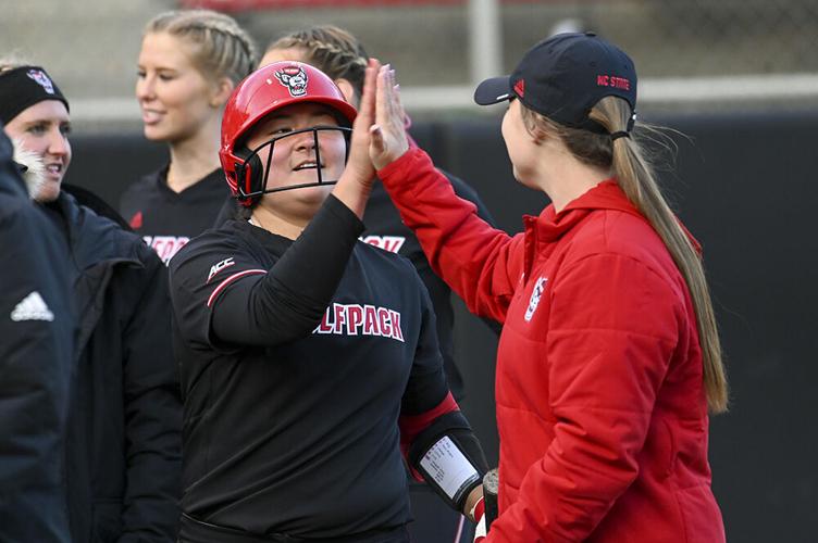 SoftballVsND_HaslerHighFive_JH.jpg