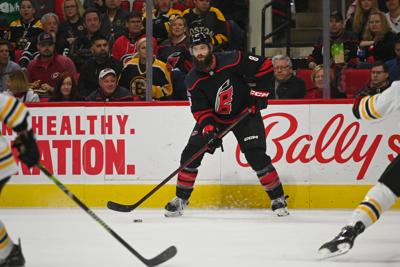 CanesVsBruins_BurnsLooksToPass_ER.JPG
