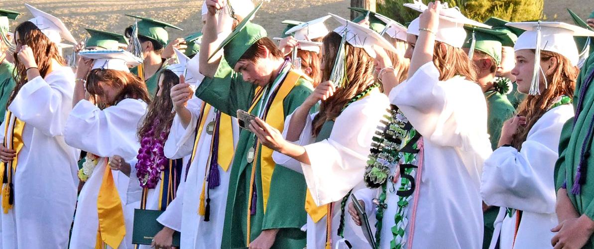PHOTO GALLERY THS Class of 2025 battled wind and noise to graduate