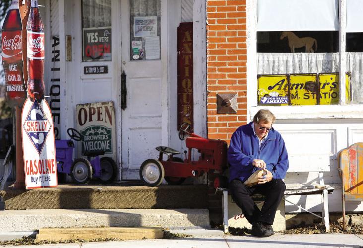 Steve Kerper's handcarved, shiny duck decoys stand out among the