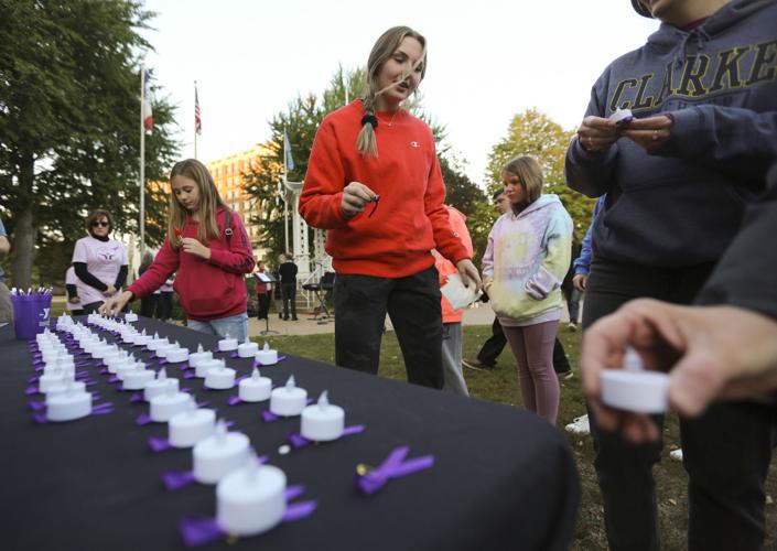 Domestic violence victims honored, share stories at candlelight vigil ...