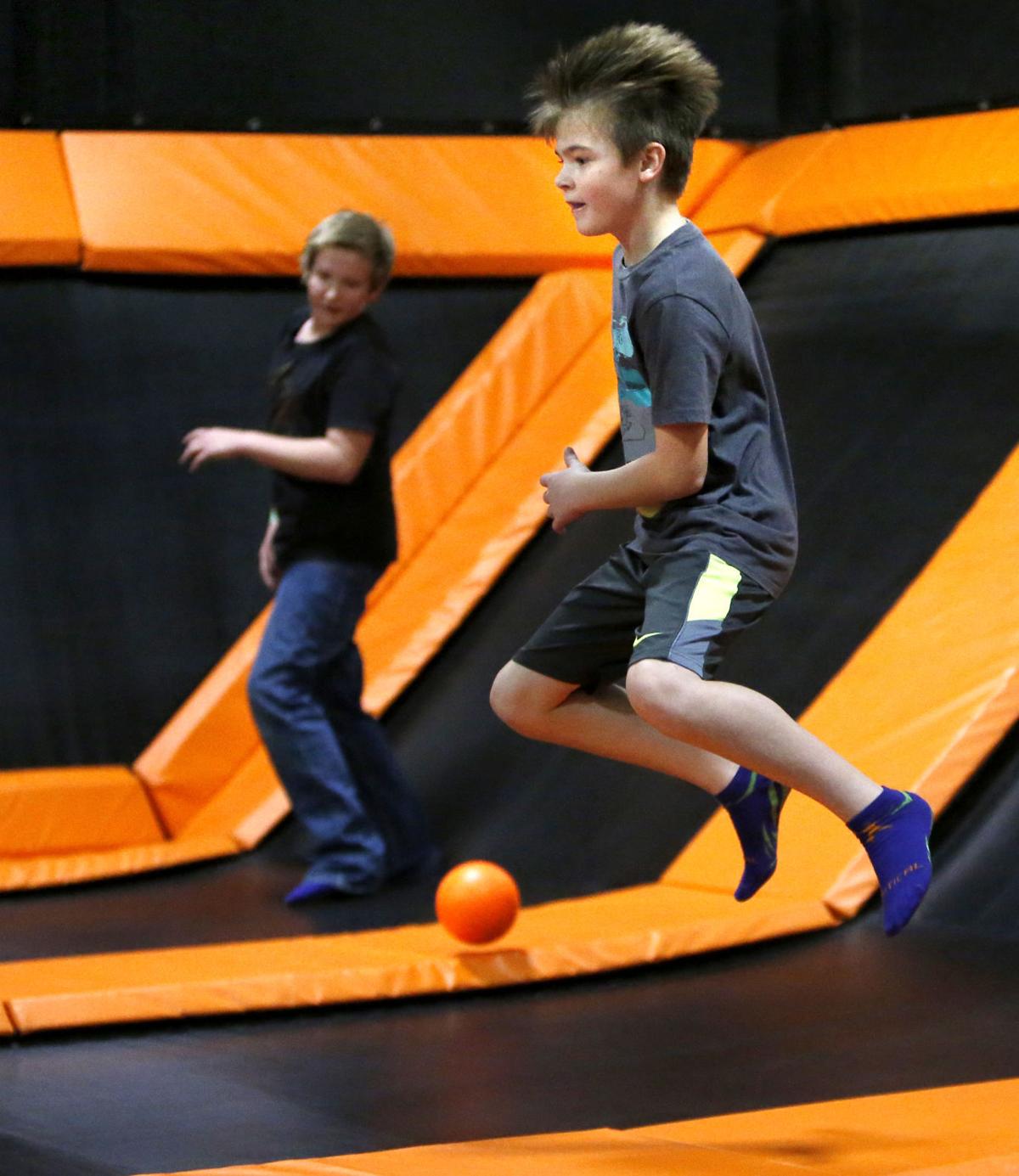 Dubuque firefighters dive into 'the pit' at Vertical Jump Park Tri