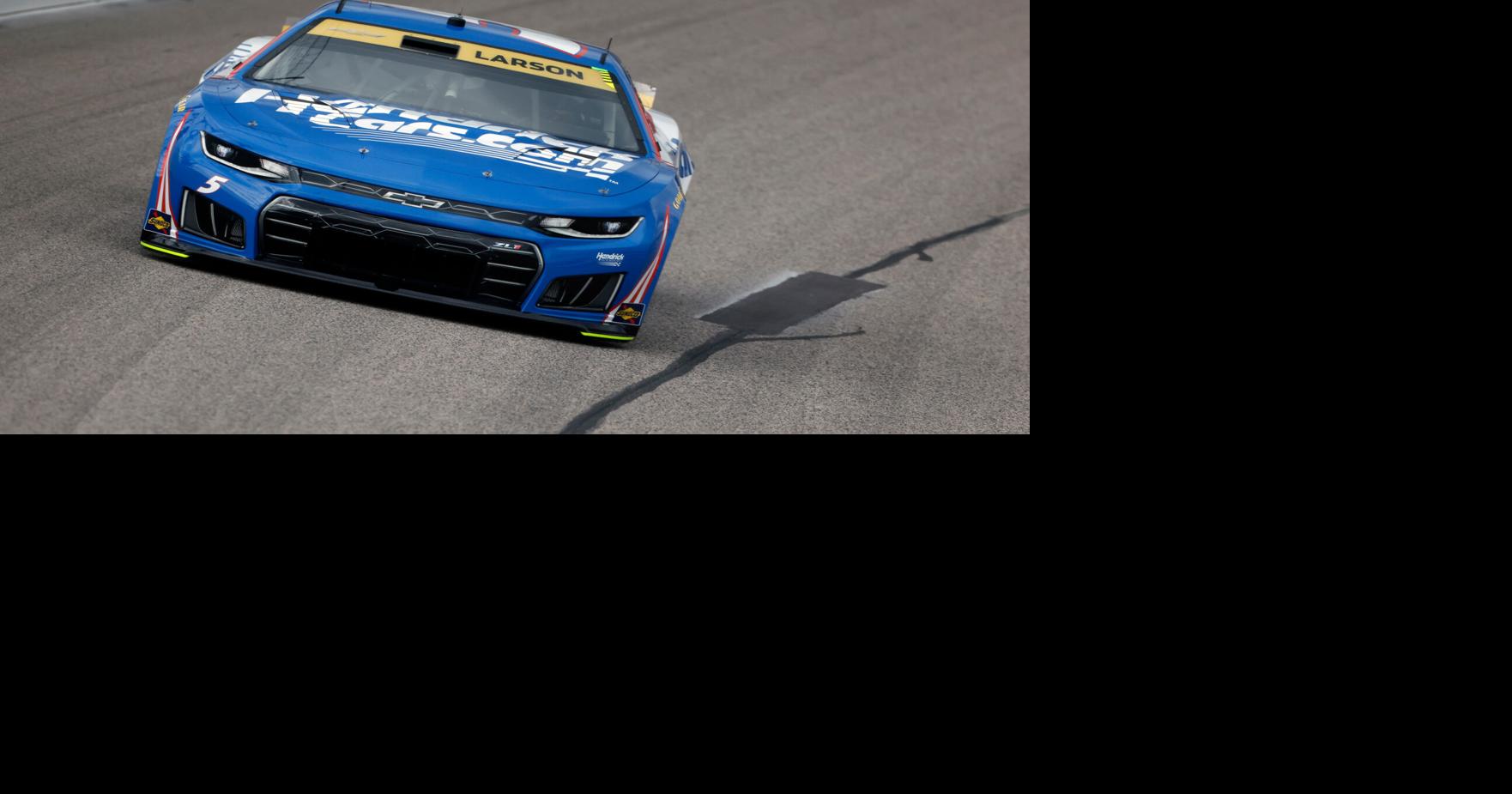 Larson passes Briscoe with 7 laps left to win for the fourth time at Kansas Speedway