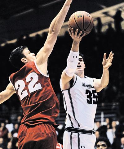 College Basketball Roundup Northwestern Runs Past Badgers