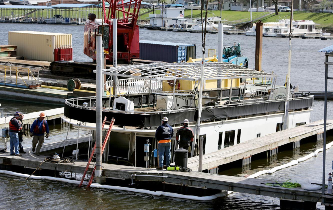 Recovery effort Sunken houseboat brought back to surface Tristate