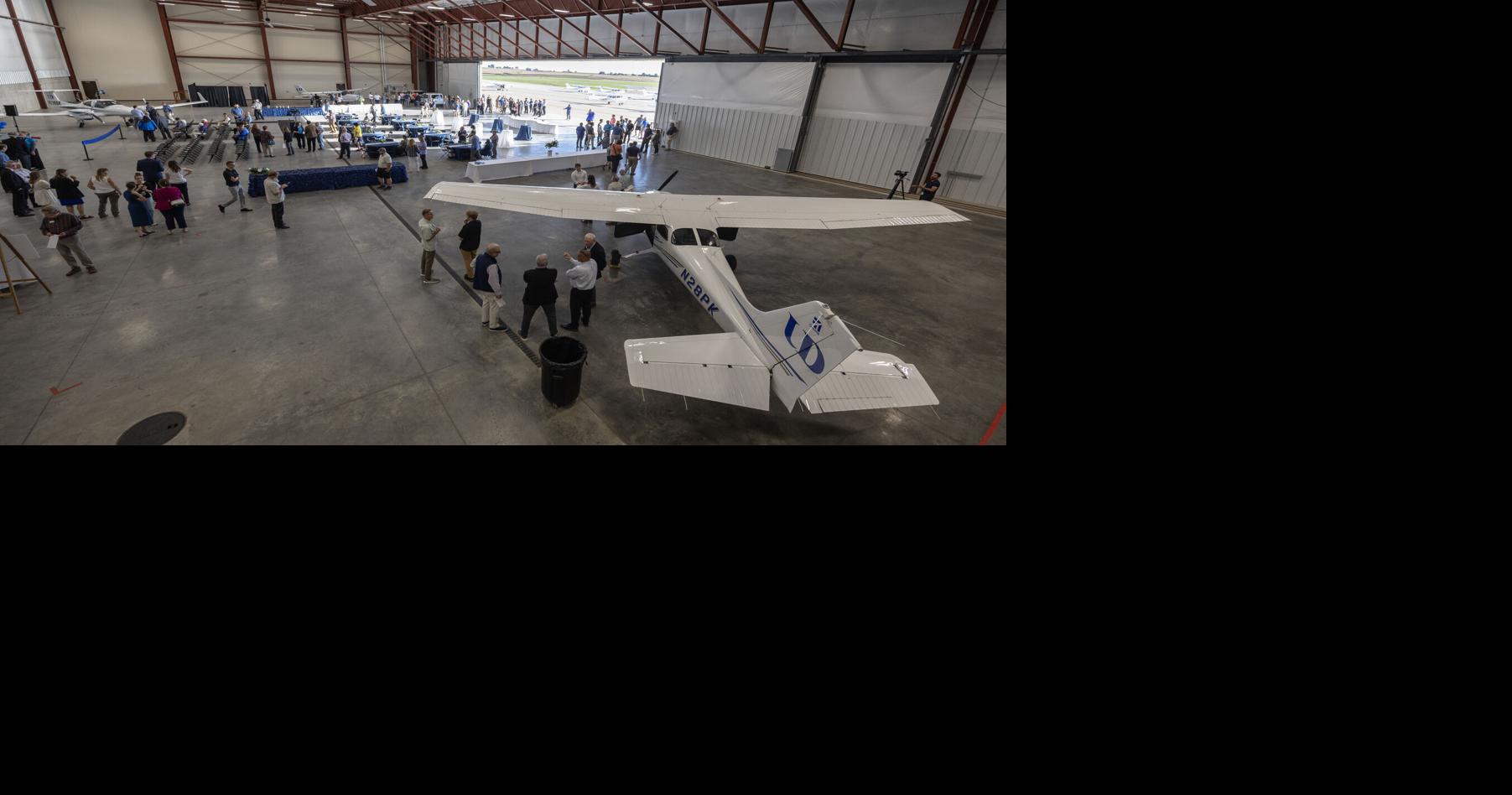 UD officials and students ribbon cut expanded Edward Babka Aviation Learning Center