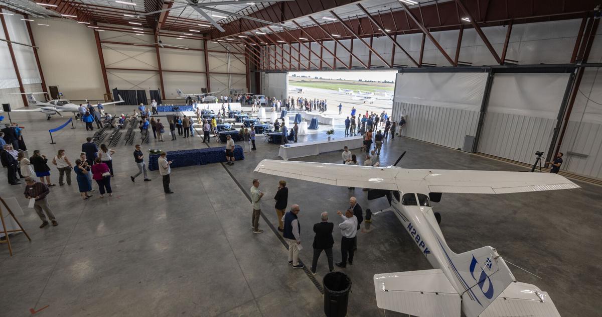 UD officials and students ribbon cut expanded Edward Babka Aviation Learning Center