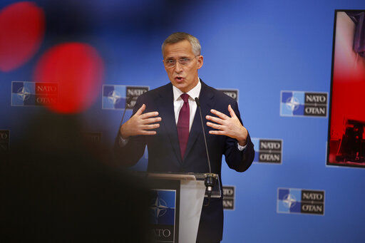 NATO chief warns Russia of 'costs' if it moves on Ukraine