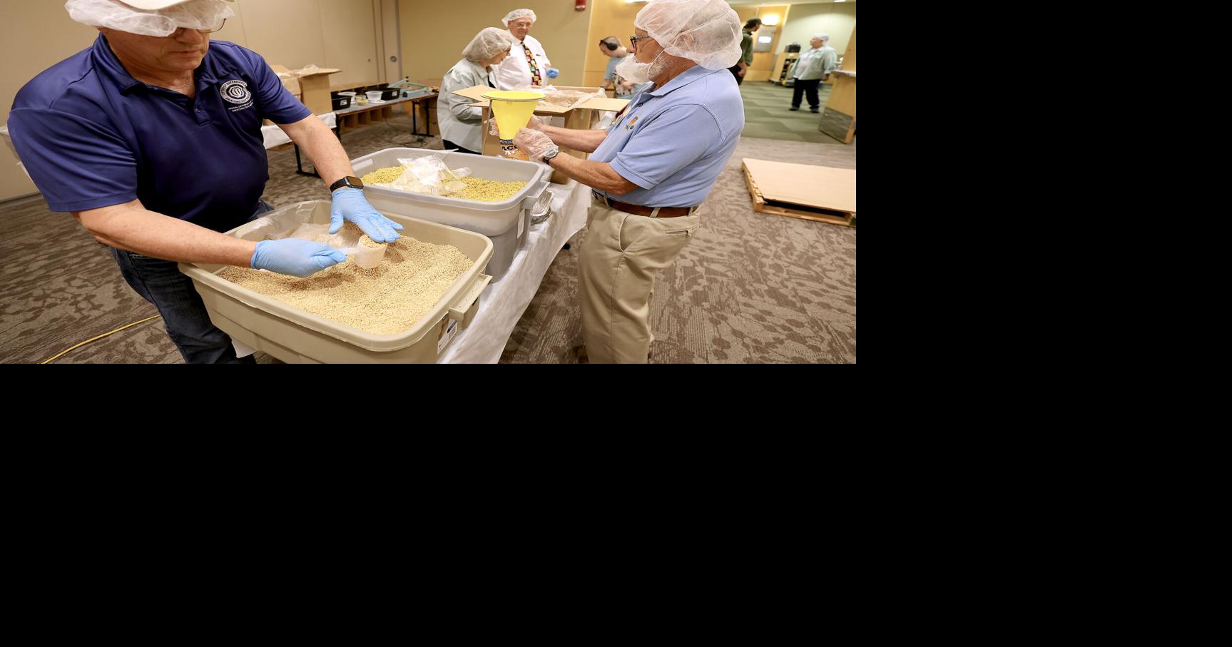Iowa Optimists convene in Dubuque, pack up to 40,000 meals
