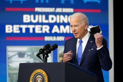 Biden team regroups after court loss on COVID shots-or-test