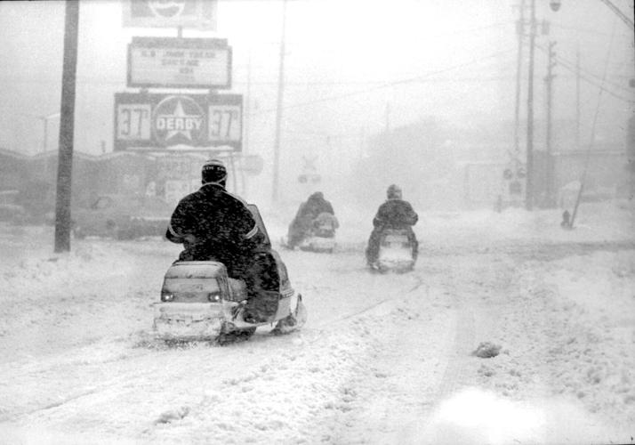 Columbia, MO families sled in fresh snow from winter storm