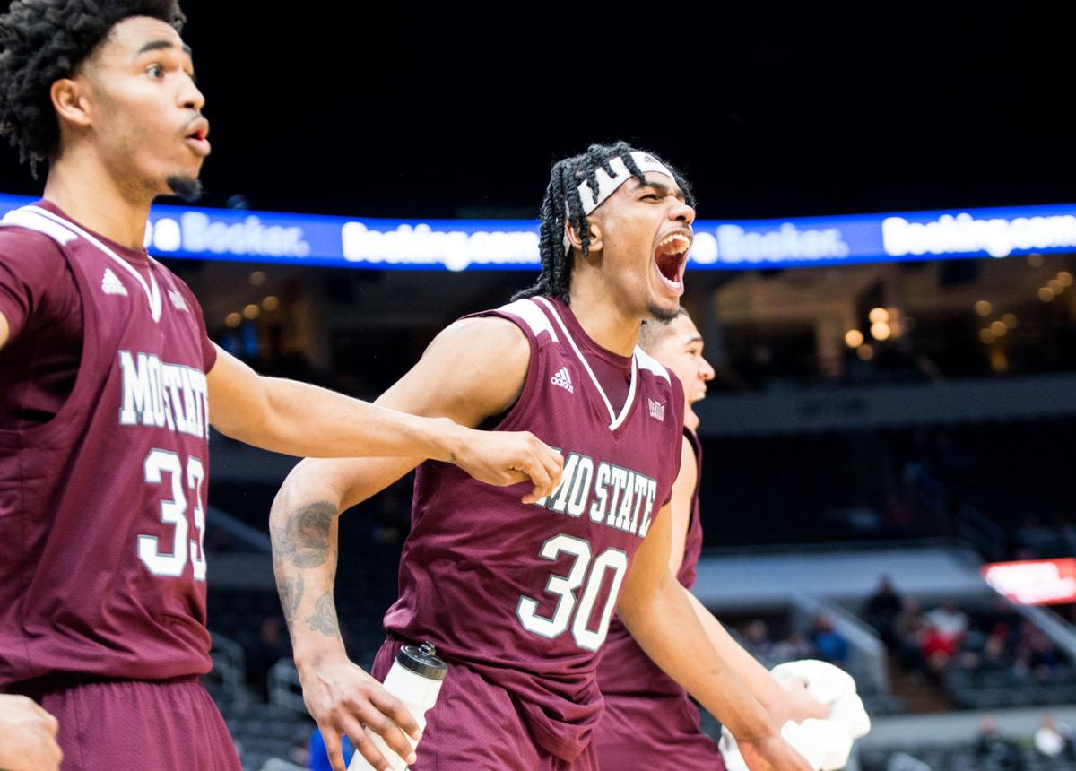 Josh Hall and Tulio Da Silva react from the sideline