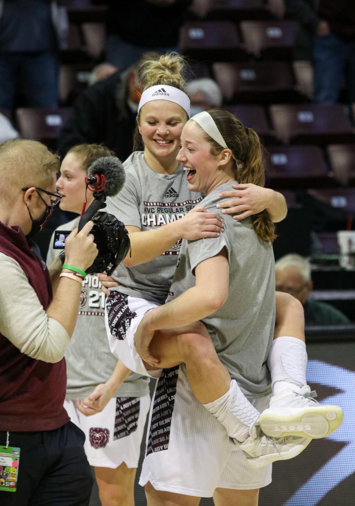 02.27.21 LadyBearsvLoyola Abby and Elle hug