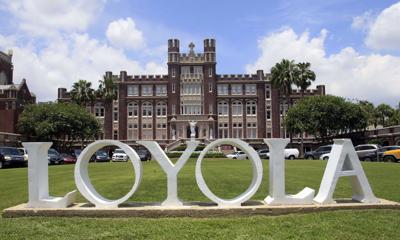 loyola university lays off