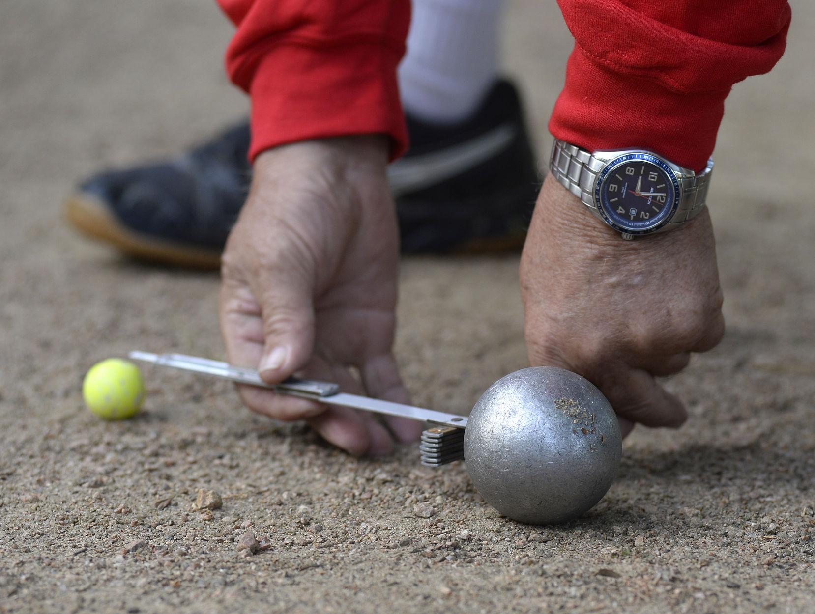 A French yard game was Monday's Google doodle. What is petanque? What are the rules