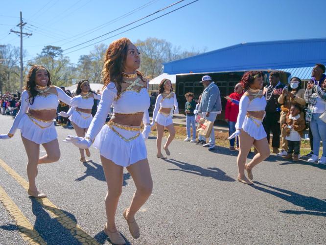Carnival returns to Clinton as Mardi Gras parade rolls through town