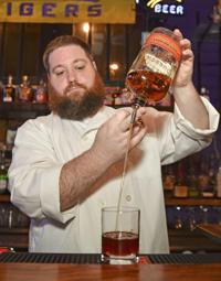 Chef George Krause runs the kitchen at Doe's Eat Place, but it all started at home