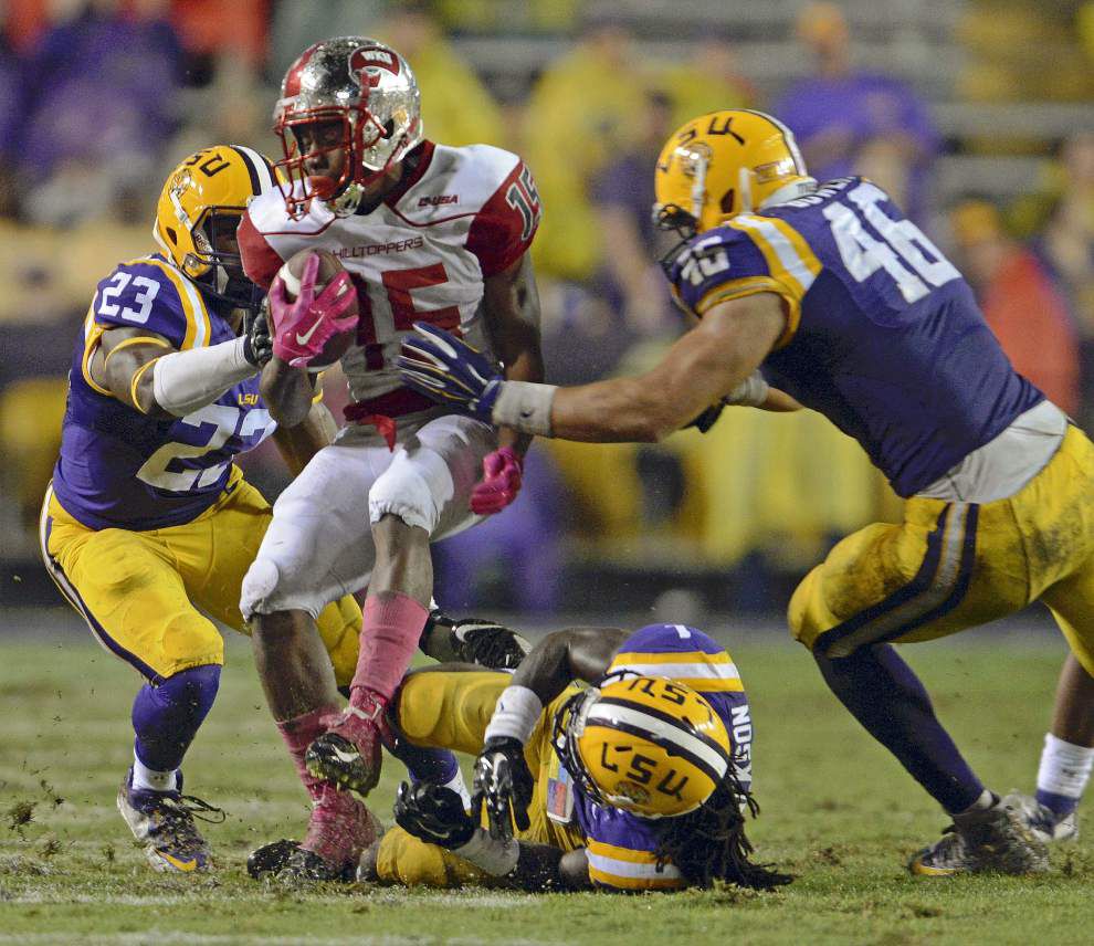 Photos: Rain, puddles and another big win in Tiger Stadium as LSU hosts Western Kentucky _lowres