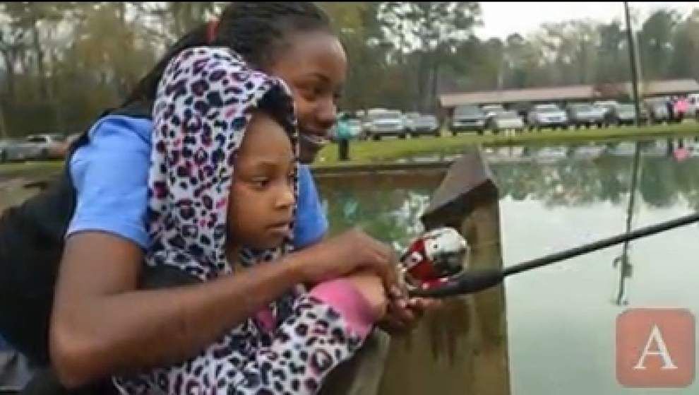 Kiwanis hosts Big Buddy youth in annual fishing event _lowres