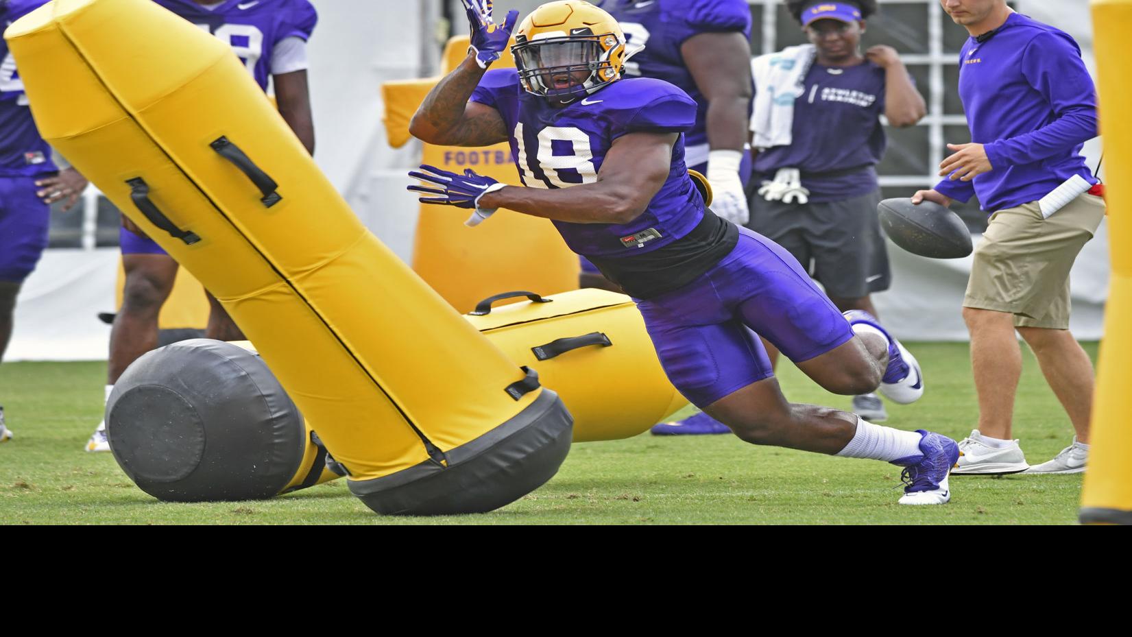 Photos: K'Lavon Chaisson returns to practice Thursday for the Tigers