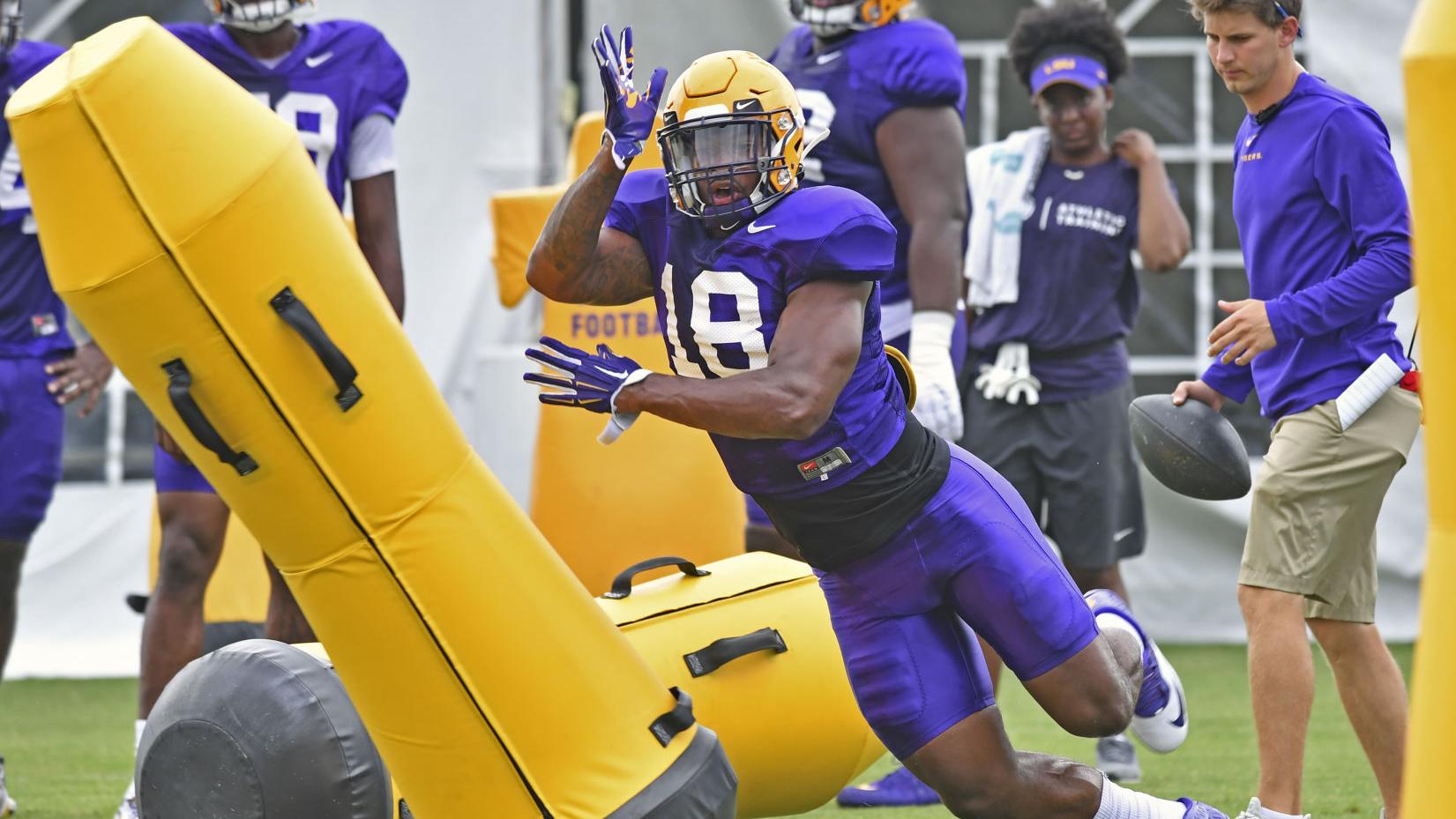 Photos: K'Lavon Chaisson returns to practice Thursday for the Tigers