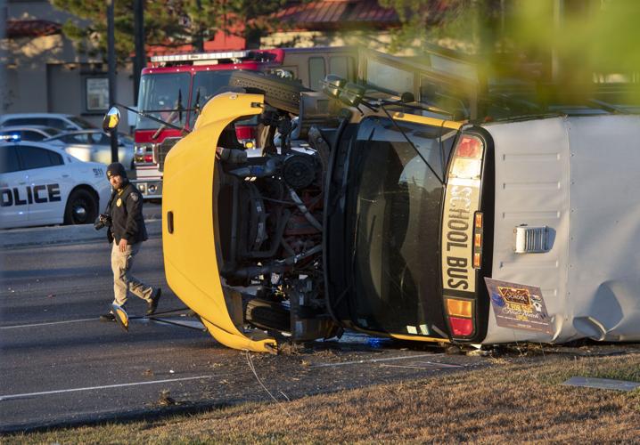 Driver who died in crash with school bus ran stop sign, officials say ...