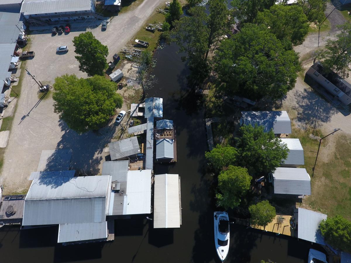 On Louisiana's bayous, houseboat living is cheap and easy but changes are in the works