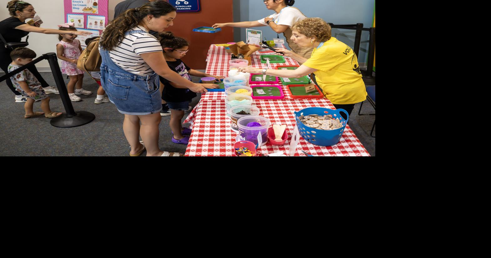Baton Rouge children count coins, earn money and more at hands-on educational experience