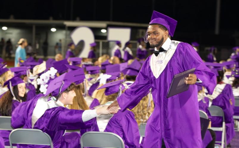Dutchtown High Class of 2023 graduates on Griffin field Ascension