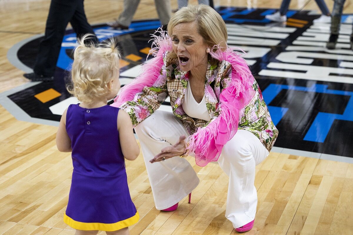 Austin Huff is wearing the Kim Mulkey jacket to see the Cubs