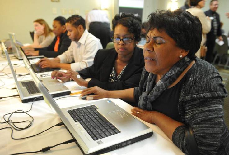Hundreds crowd Lafayette hotel to interview for jobs at Ambassador Town