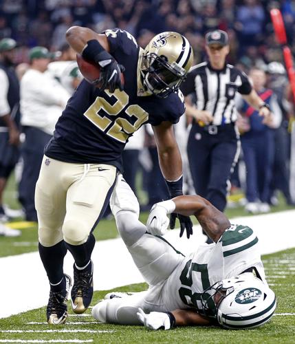 New Orleans Saints running back Mark Ingram (22) is tackled by