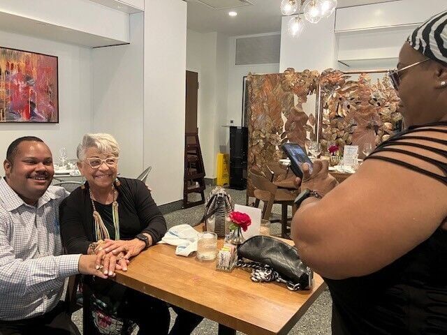 Jari Honora, Wanda Rouzan take a photo at Chapter IV