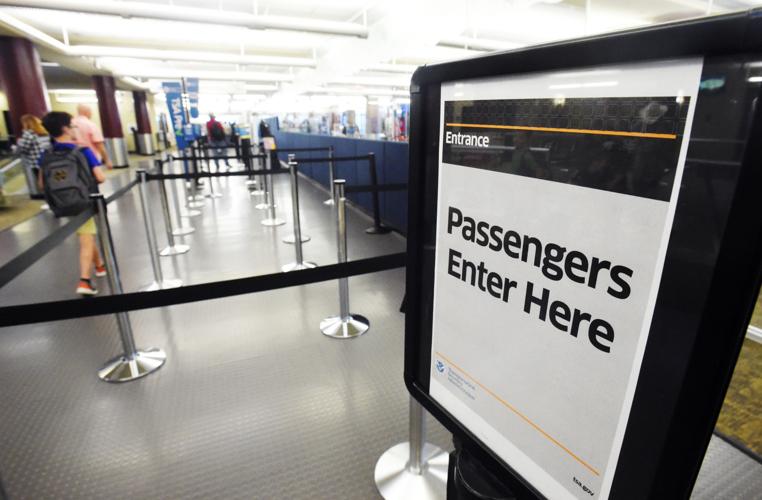 Summer spike, overlapping departures causing missed flights, long TSA