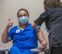 Despite first coronavirus vaccines, rising hospitalizations, cases show pandemic's far from over