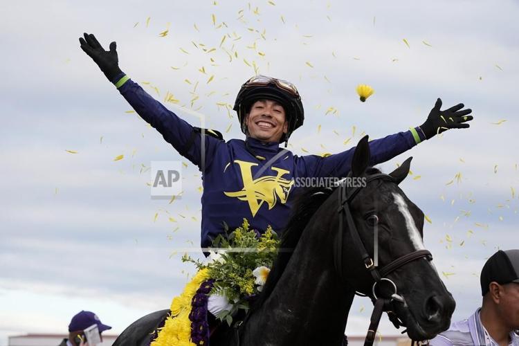 Jockey Jose Ortiz wins the 2024 Breeders Cup Mile aboard More Than Looks