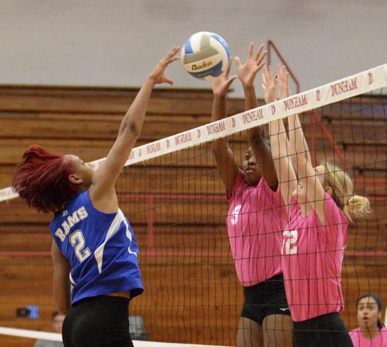 Dunham opens volleyball playoffs with sweep of West St. John High