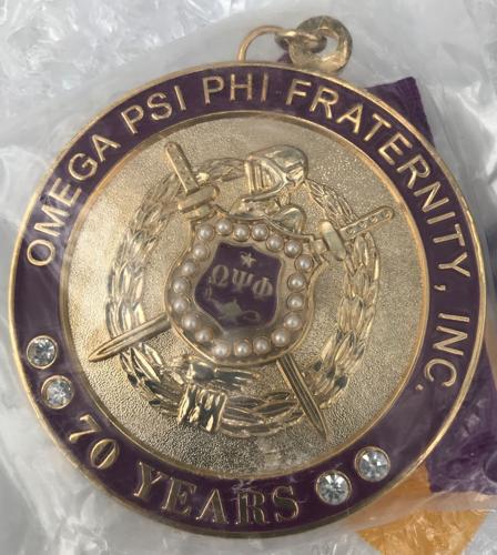 Dr. Sutton's 70-year Omega medallion